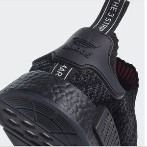 nmd stlt pk triple black